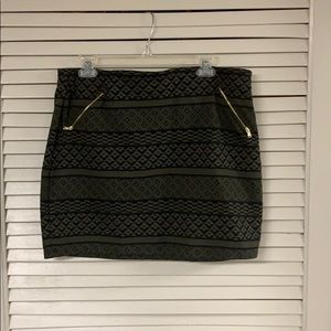 Green and black patterned skirt